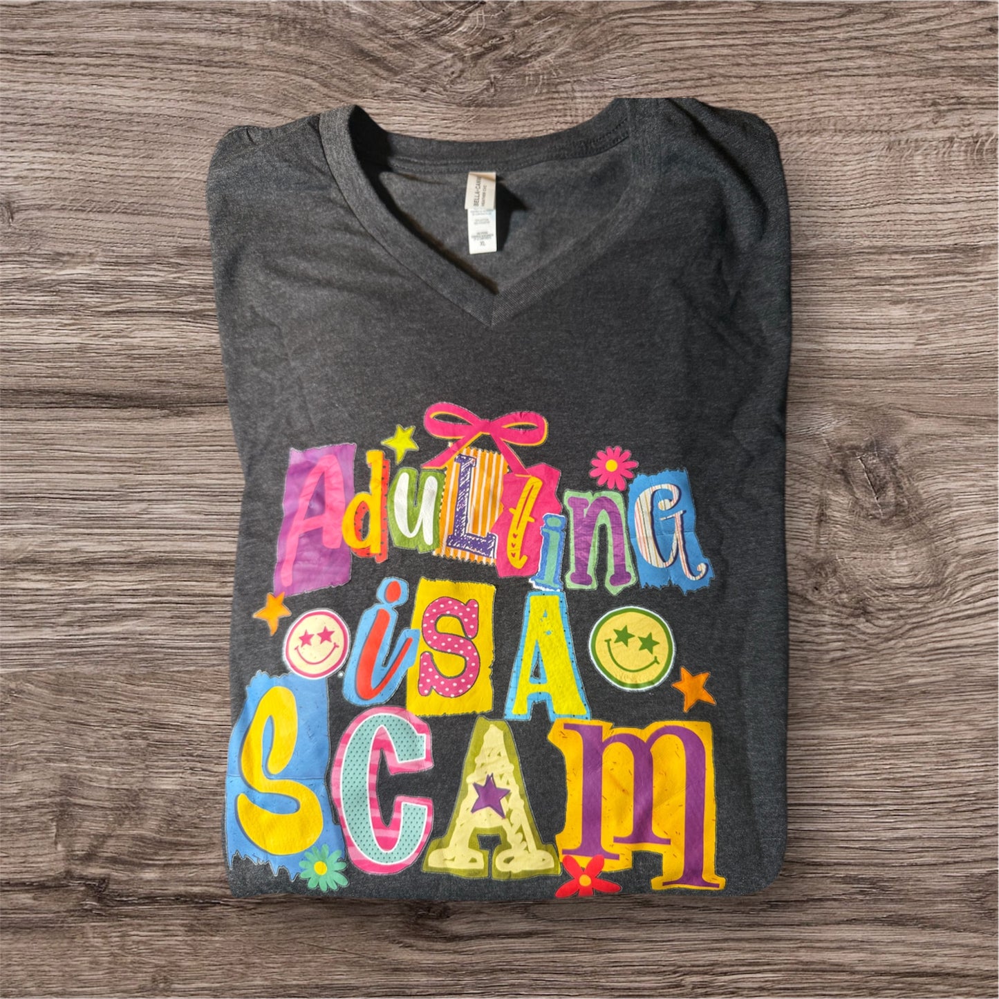 Adulting Is a Scam Graphic Tee